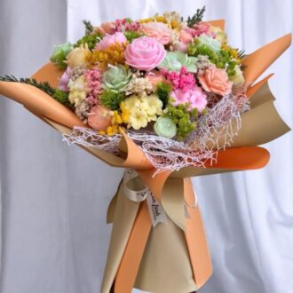 Bó hoa nến thơm 30 bông tone cam hồng pastel giấy gói cam hiện đại Can Lãnh Artisanal Candles